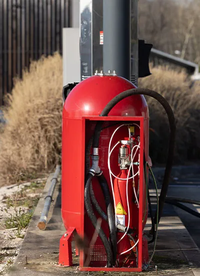 Système d'extinction automatique sur une borne de distribution de carburant